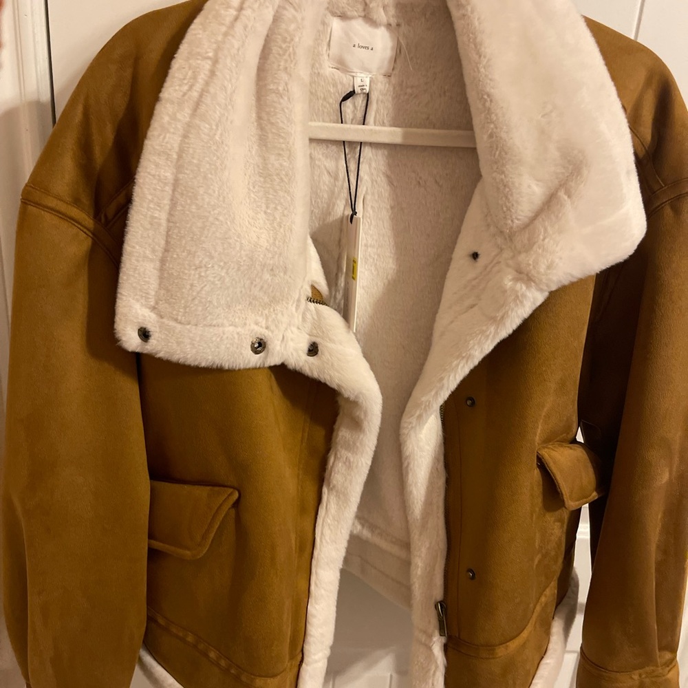 Tan jacket! Never worn. Perfect for the winter.
